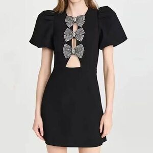 Sierra Darien black mini dress bow puff sleeves
